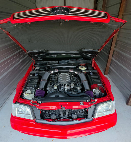 Red car with open hood inside a garage mr129 intake ram air cold m113 m112 engine